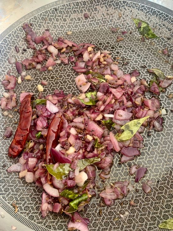 Step 1.1: Add chopped onions and cook until they are soft and slightly golden