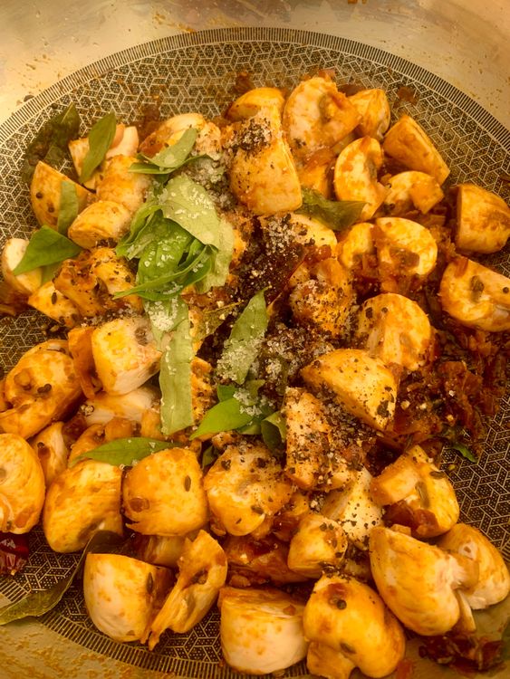 Step 1.3: Add the mushrooms along with coarsely ground black pepper, the remaining curry leaves, lemon juice, and salt