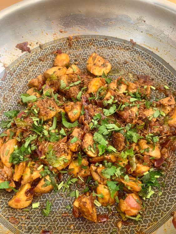 Step 1.1: Sprinkle in the roasted cumin powder and fresh coriander leaves