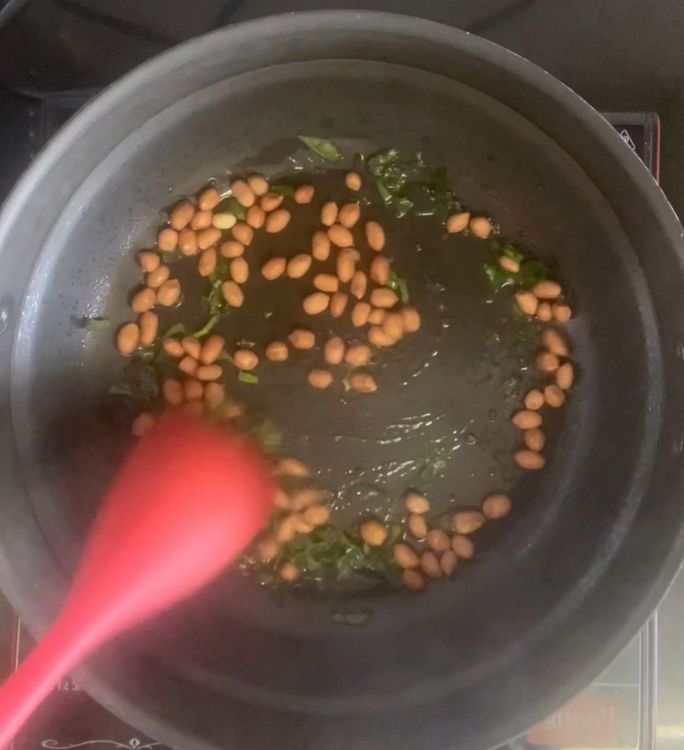 Step 1.1: Add mustard seeds ,curry leaves chopped and peanuts