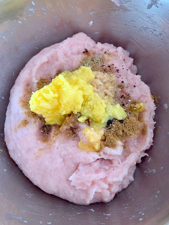 Step 1.1: In a large bowl, mix the chicken mince with salt, cumin powder, green and black cardamom, ginger-garlic paste, and ghee