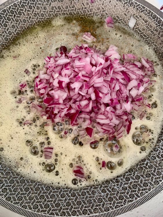 Step 2.1: Add chopped onions and sauté for 3–4 minutes until translucent