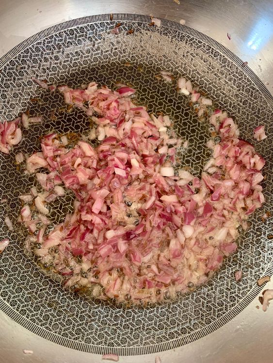 Step 2.2: Add chopped onions and sauté for 3–4 minutes until translucent