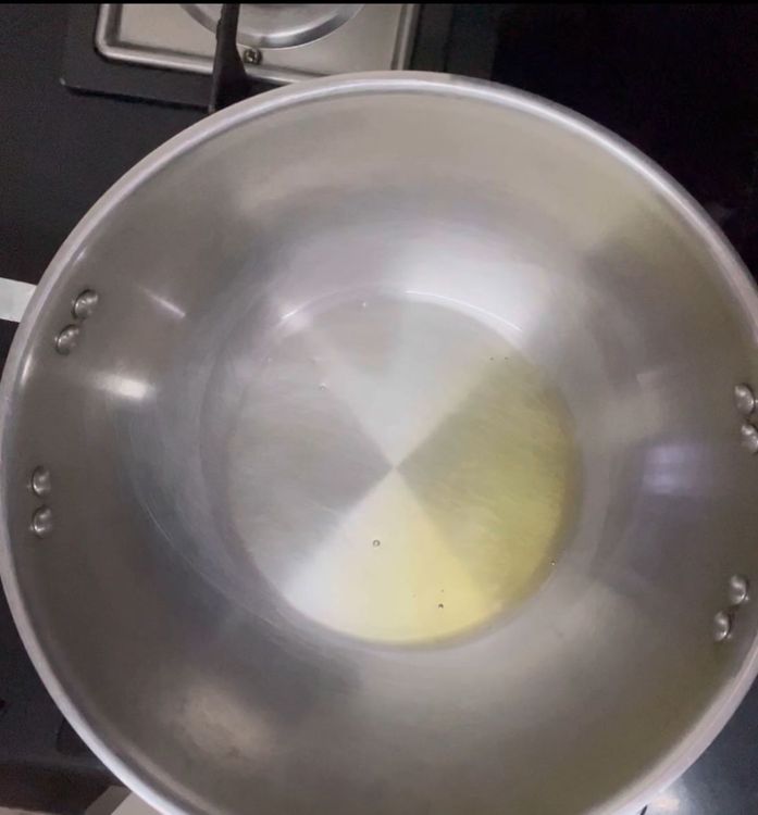 Step 1.1: Now take a pan n heat oil