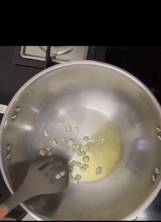 Step 1.1: Add garlic followed by onion and sauté it