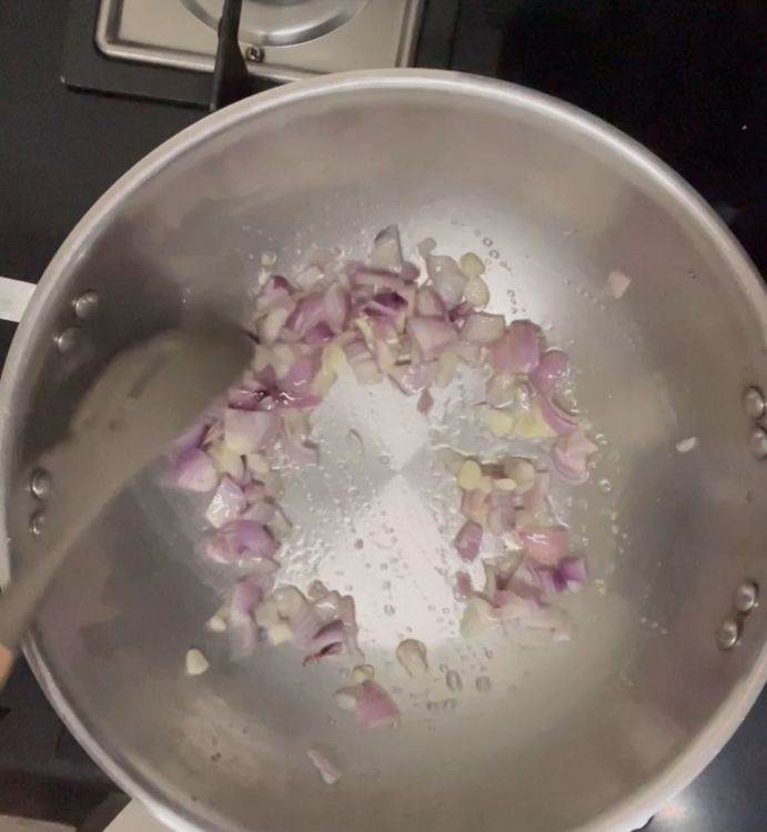 Step 1.2: Add garlic followed by onion and sauté it