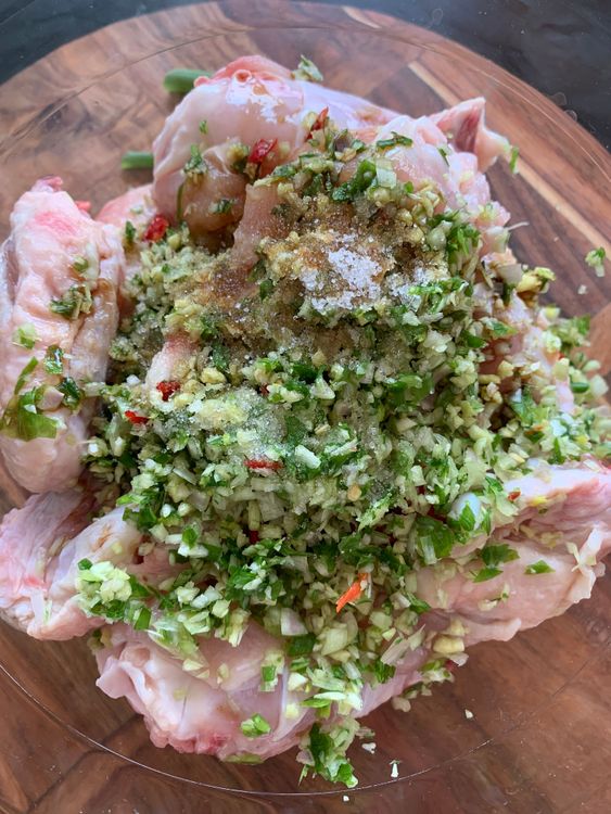 Step 1.1: Marinate the chicken wings in a large mixing bowl with the chopped ingredients, fish sauce, soy sauce, and sugar