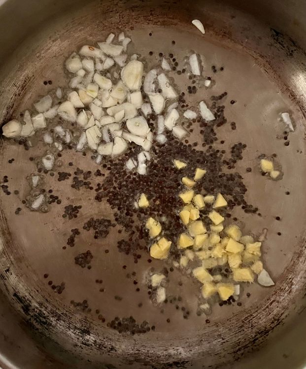 Step 1.1: Once that happens, add the ginger and garlic