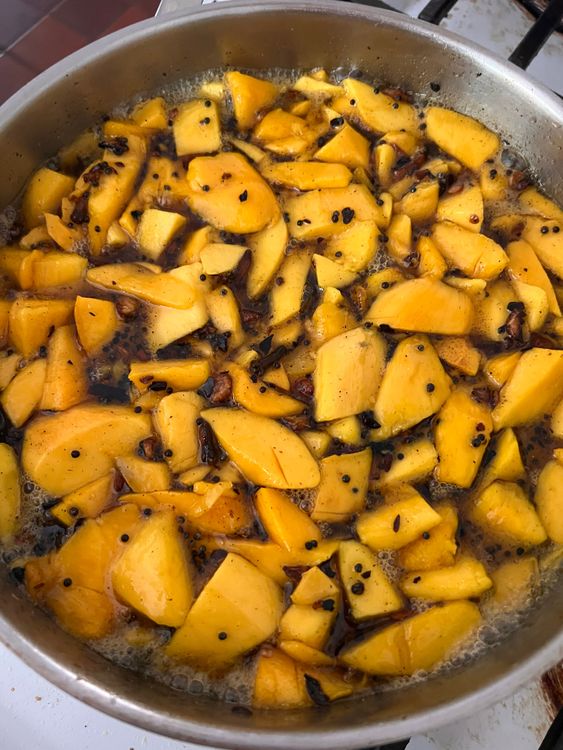 Step 1.2: Add in the mangoes, sugar, and vinegar and stir to combine