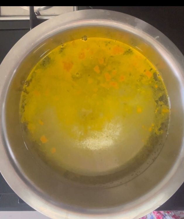 Step 1.1: Boil water in a big bowl and add turmeric powder
