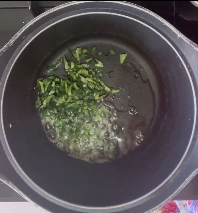 Step 1.2: Add mustard seeds, green chilli and curry leaves
