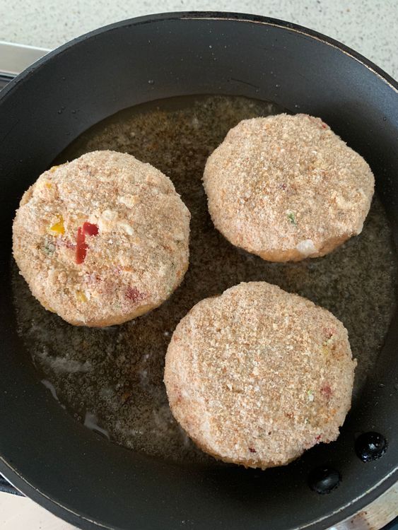 Step 3.1: Once the oil is hot, place the coated cutlets carefully into the pan