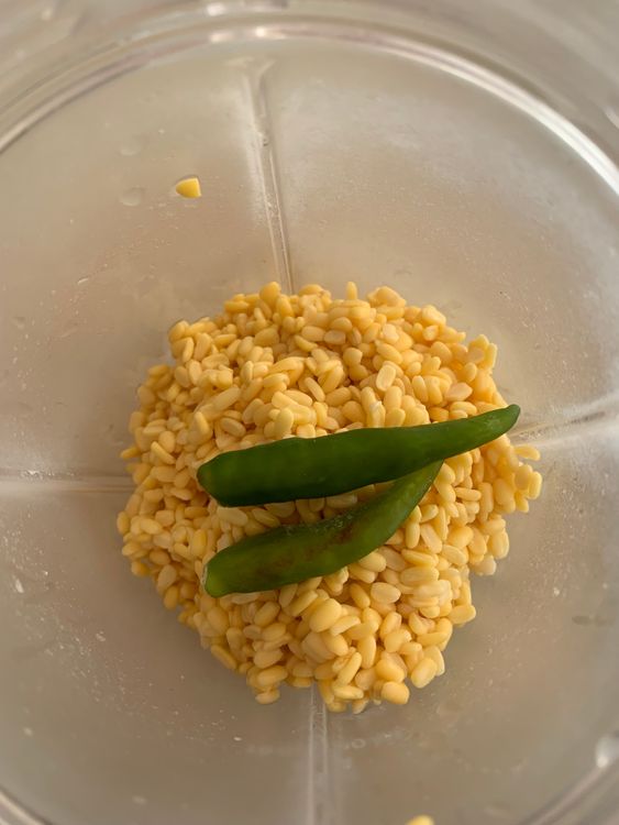 Step 1.1: Drain the water and blend the dal with green chillies and water (1/4 to 1/2 cup, as needed) into a smooth, medium-thick pourable batter