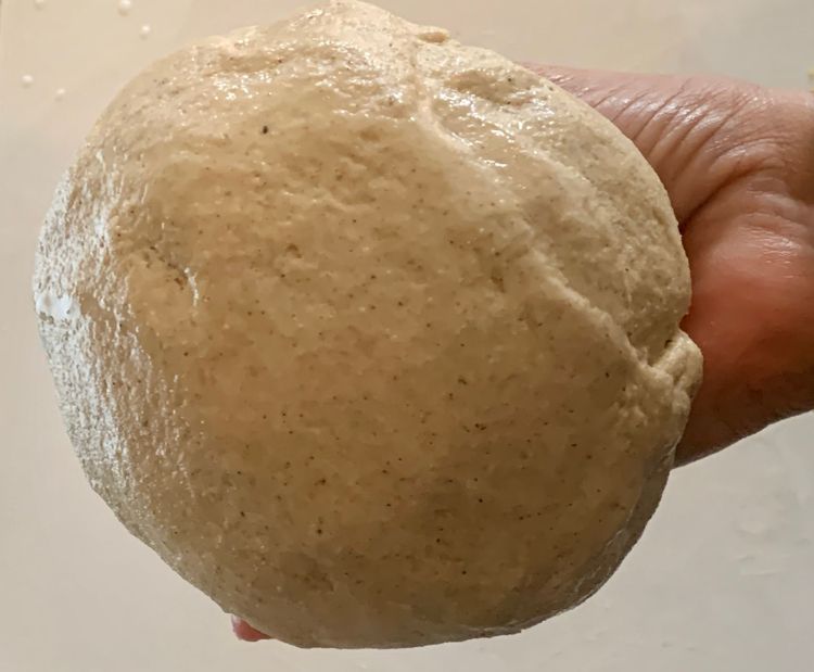 Step 1.1: Brush the dough with a spoon of oil and knead for 2-3 minutes