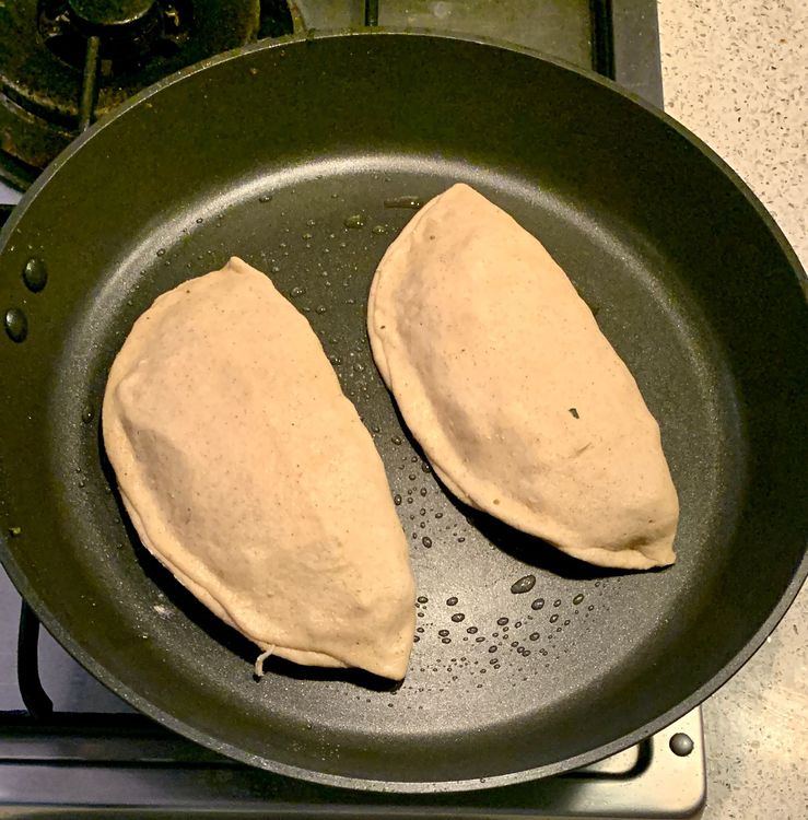 Step 2.1: Place the stuffed paratha on the hot skillet and cook for 3-4 minutes