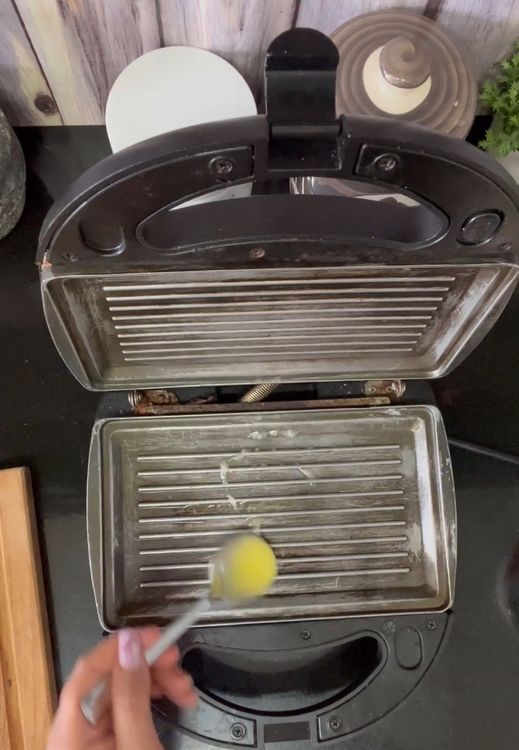 Step 1.1: Take a griller and grease with ghee