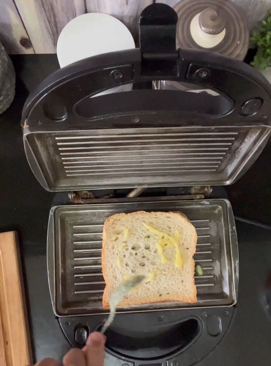 Step 1.1: Put the stuffed bread slices and apply ghee on the top too