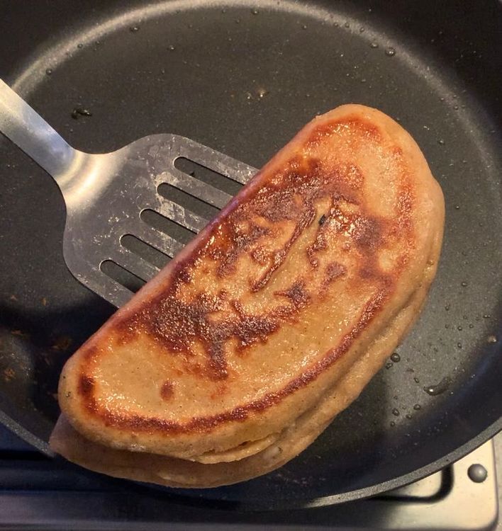 Step 2.2: Apply oil to both sides of the paratha and cook until golden brown from all sides