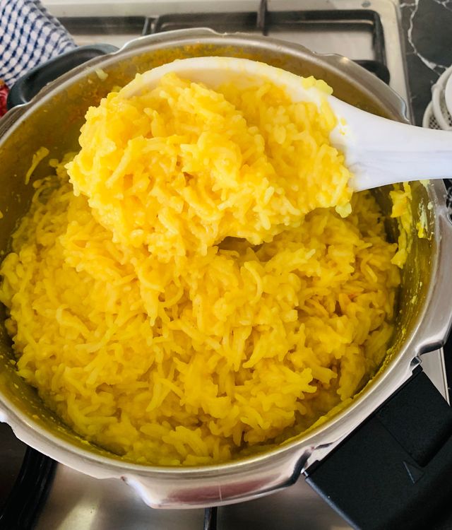 Step 1.2: If using a pressure cooker, add the soaked rice and dal to the cooker with water, salt, and turmeric