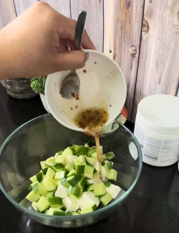 Step 1.1: Add paneer ,cucumber and dressing in a big bowl followed by a good mix