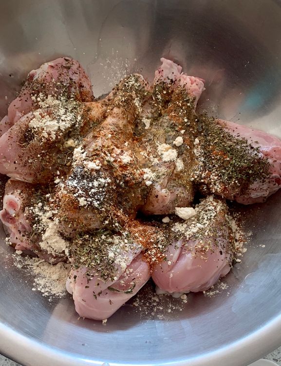 Step 1.1: Add oregano, mixed herbs, basil, black pepper powder, cayenne powder, garlic powder, lemon juice, salt and oil to the bowl