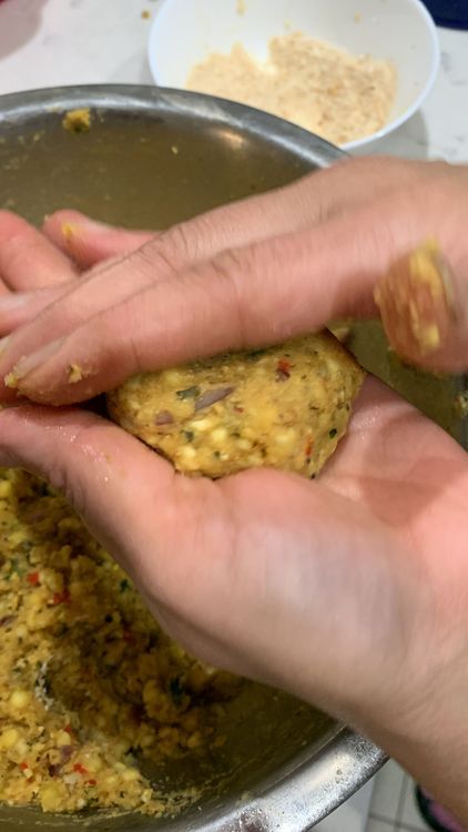 Step 1.1: Grease your palm with oil and take a small portion of the sago mixture