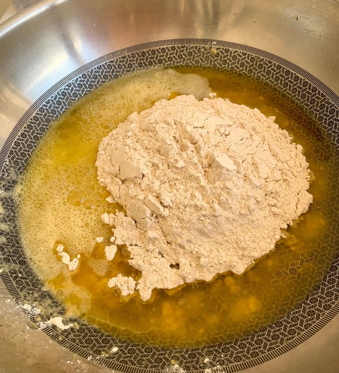 Step 1.1: Add the wheat flour (atta) and mix well