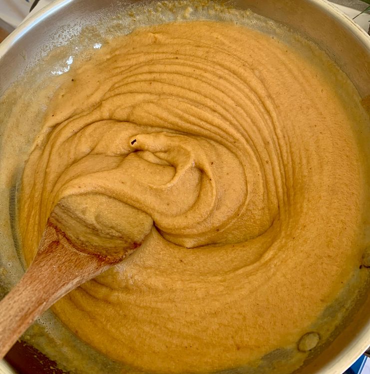 Step 1.2: Carefully pour water into the kadai or pan, as the mixture may bubble and splutter
