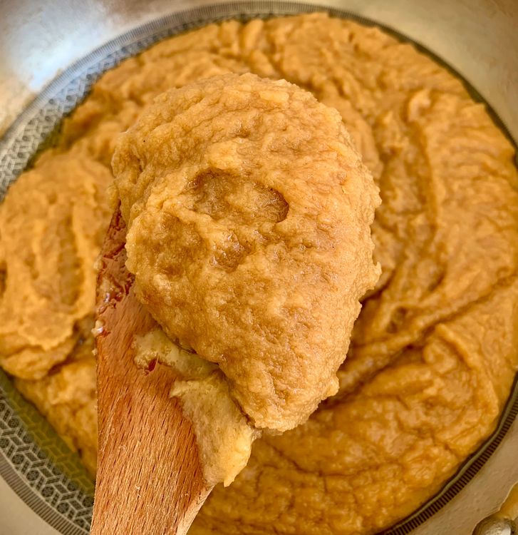 Step 1.3: Add sugar and stir continuously until it combines, and the ghee starts to separate, leaving the pan's edges