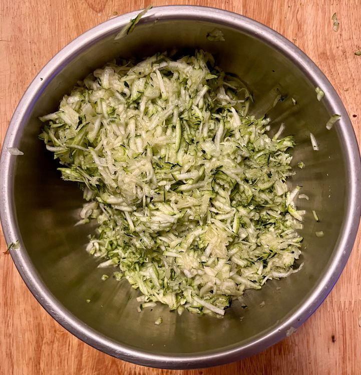 Step 1.1: Grate the zucchini in a large bowl