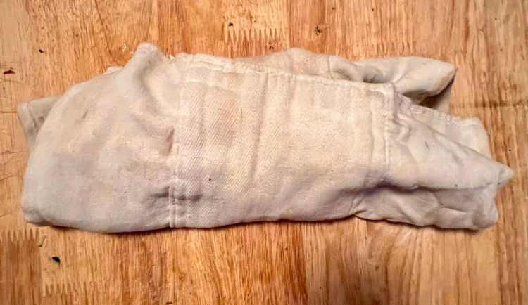 Step 1.2: Once the zucchini is done weeping, place on a clean, dry tea towel