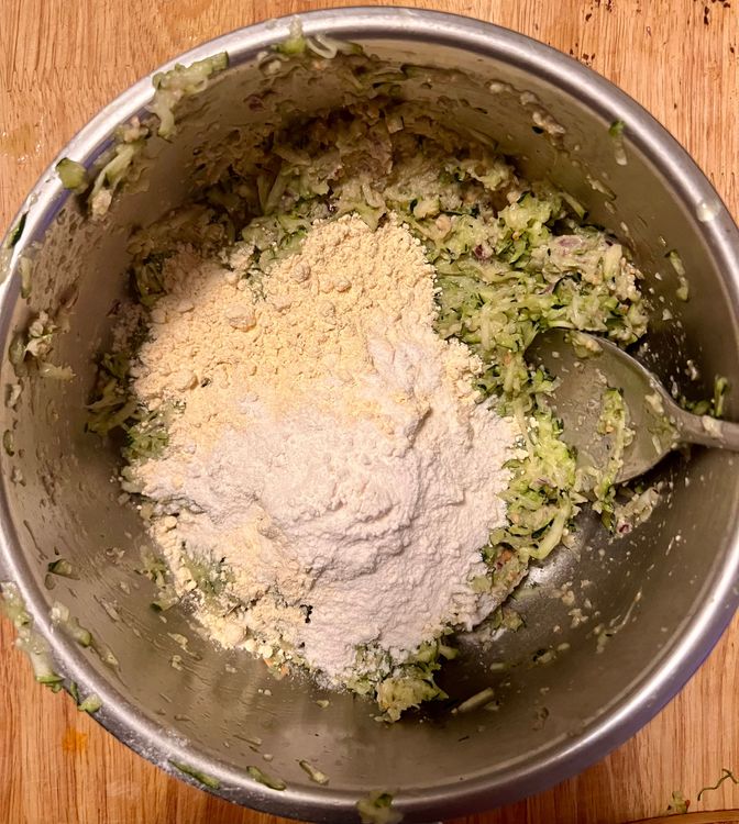 Step 1.1: Place the zucchini back in the bowl, then mix in the paste, the chickpea flour, rice flour, and cilantro