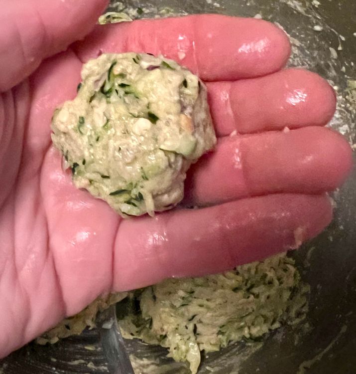 Step 1.1: Using your hands, take a tablespoon’s worth of the zucchini mixture and roll it so it becomes a ball