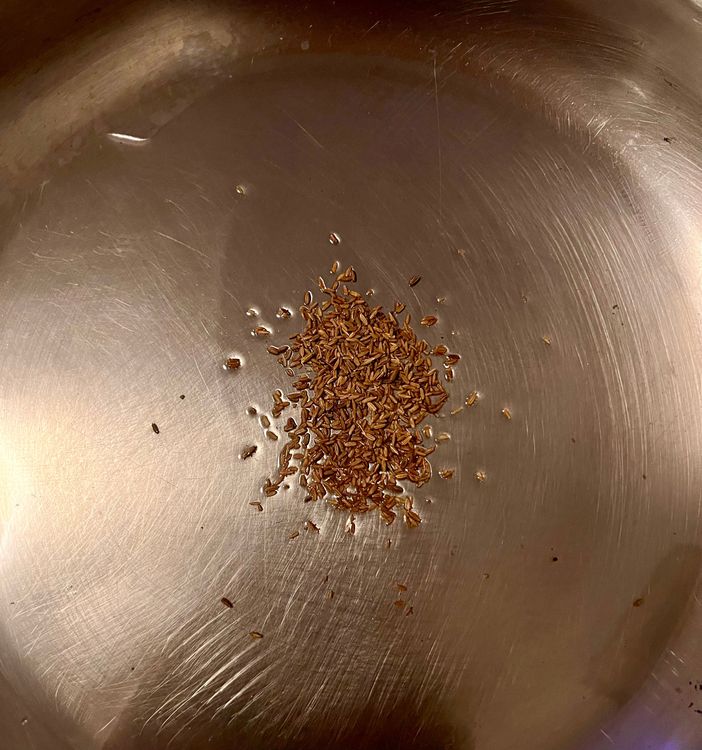 Step 2.1: Taking a large sauté pan, heat a tbsp of vegetable oil over medium heat