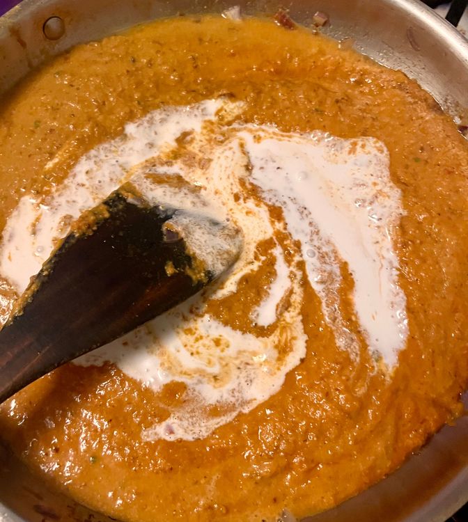 Step 2.1: Place the mixture back in the pan over low heat, add a 1/2 cup of water, a 1/4 cup of coconut milk, and the garam masala
