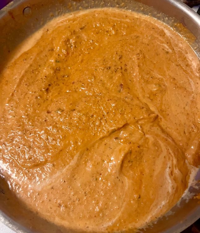 Step 2.2: Place the mixture back in the pan over low heat, add a 1/2 cup of water, a 1/4 cup of coconut milk, and the garam masala