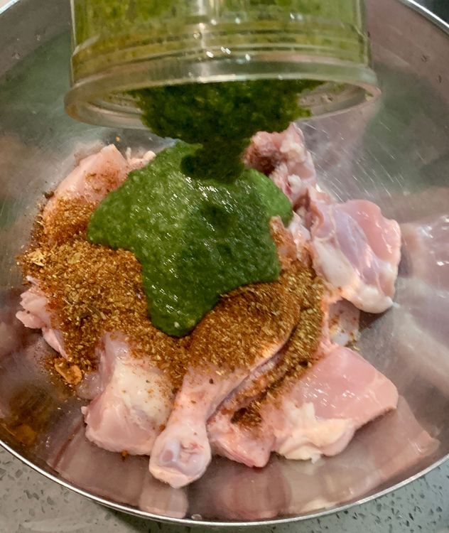 Step 1.1: Marinate the chicken pieces with ground spices, mint paste, and salt in a mixing bowl