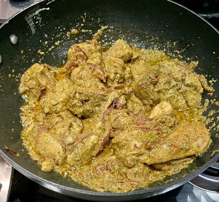 Step 1.1: Add the marinated chicken to the wok and mix well with the onions
