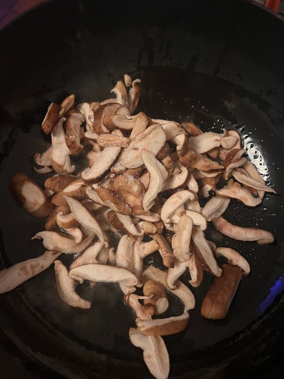 Step 1.1: Heat a couple tablespoons of the vegetable oil in a Dutch oven over medium heat