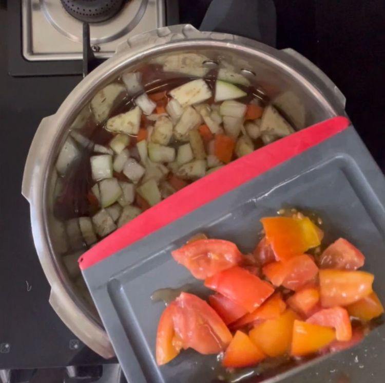 Step 1.1: Add water and one tomato in the cooker