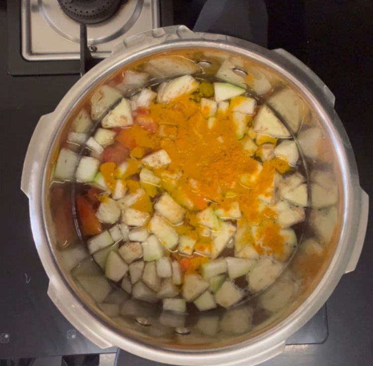 Step 1.1: Add salt, turmeric powder and hing and give 5-6 whistles