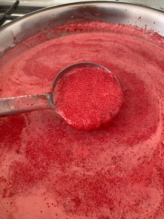 Step 5.2: Pour in the milk and sprinkle the cardamom powder