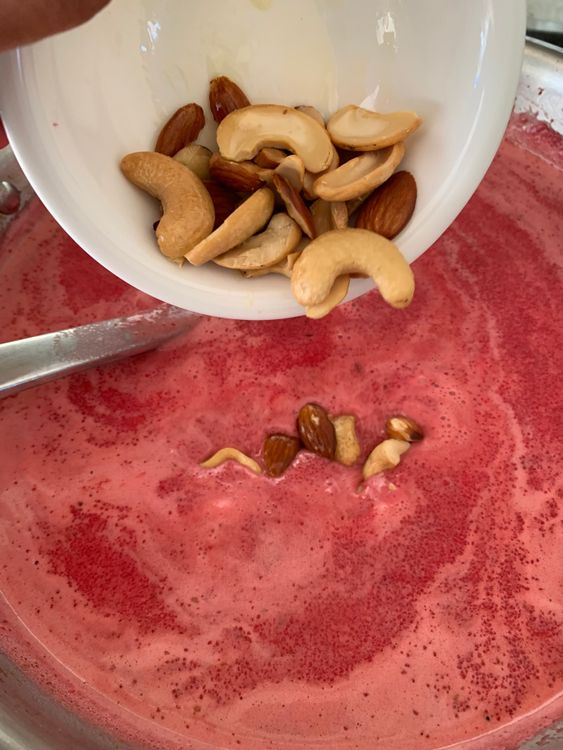 Step 6.1: Stir in the roasted nuts and turn off the heat