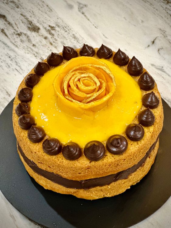 Step 1.2: Enjoy this cake as it is with a dusting of icing sugar or a cup of tea, or frost it with whipped cream and top with slices of juicy mangoes