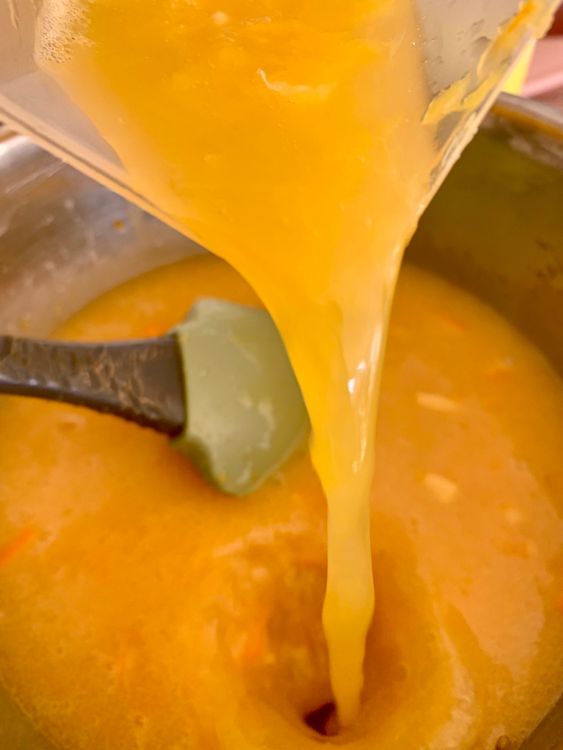 Step 4.1: Pour in the orange juice, then gradually fold in the dry ingredients