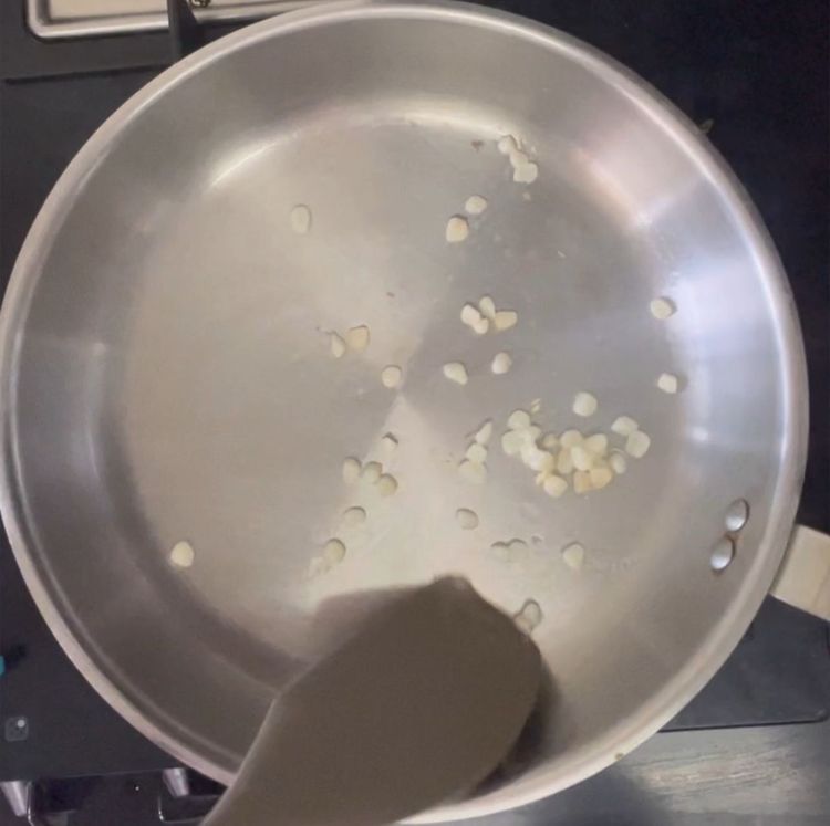 Step 1.1: In a pan take oil and add minced garlic followed by tomatoe puree