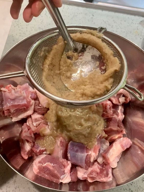 Step 1.1: Marinate the mutton pieces in a mixing bowl with the ground paste, degi mirch powder and salt