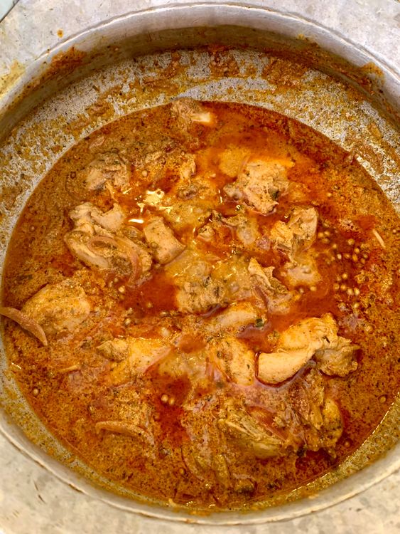 Step 4.1: Reduce to low, cover the pan, and let it cook slowly for 40–45 minutes, stirring occasionally