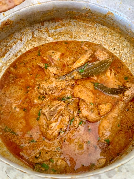 Step 5.1: Once the chicken is fully cooked and tender, remove the lid and increase the heat to reduce the gravy to your desired consistency