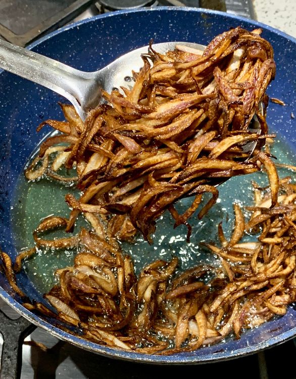 Step 2.2: In a pan, heat oil over high heat